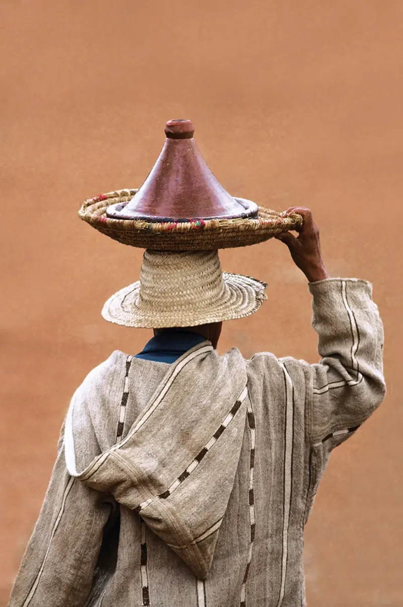 Portrait of a man carrying a tajine, Marrakech